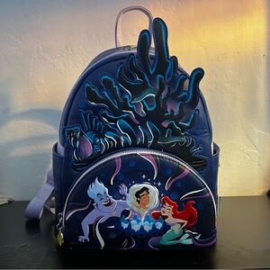 NWT Loungefly Disneyโs The Little Mermaid Ursulaโs Lair Glow Mini Backpack
